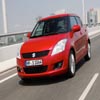 Red Suzuki Swift 2011